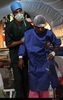 بیمار بعد از عمل جراحی در بیمارستان صحرایی